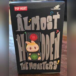 Pop Mart The Monsters Action Figure - Red and Yellow